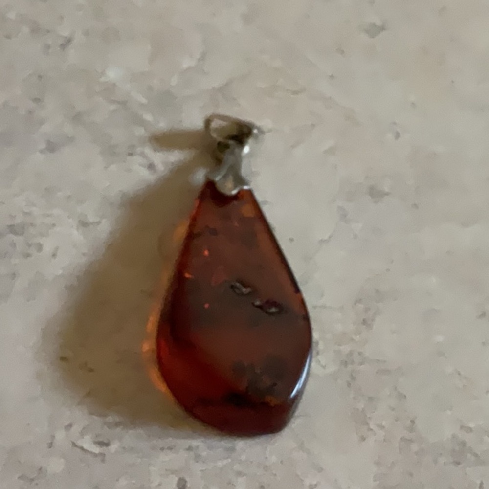 Vintage Amber pendant on silver.